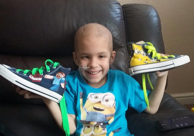 Nathan with their Supershoes