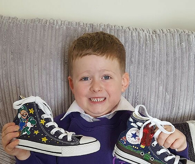 Ryan with their Supershoes
